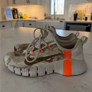 Nike Kids Camouflage Sneakers with Orange Highlights